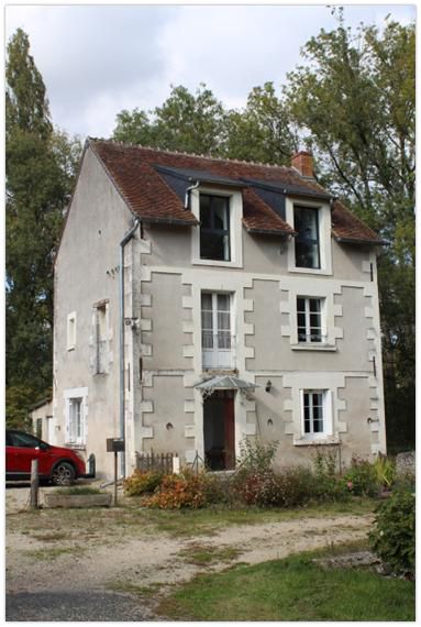 Façade d'un moulin après travaux