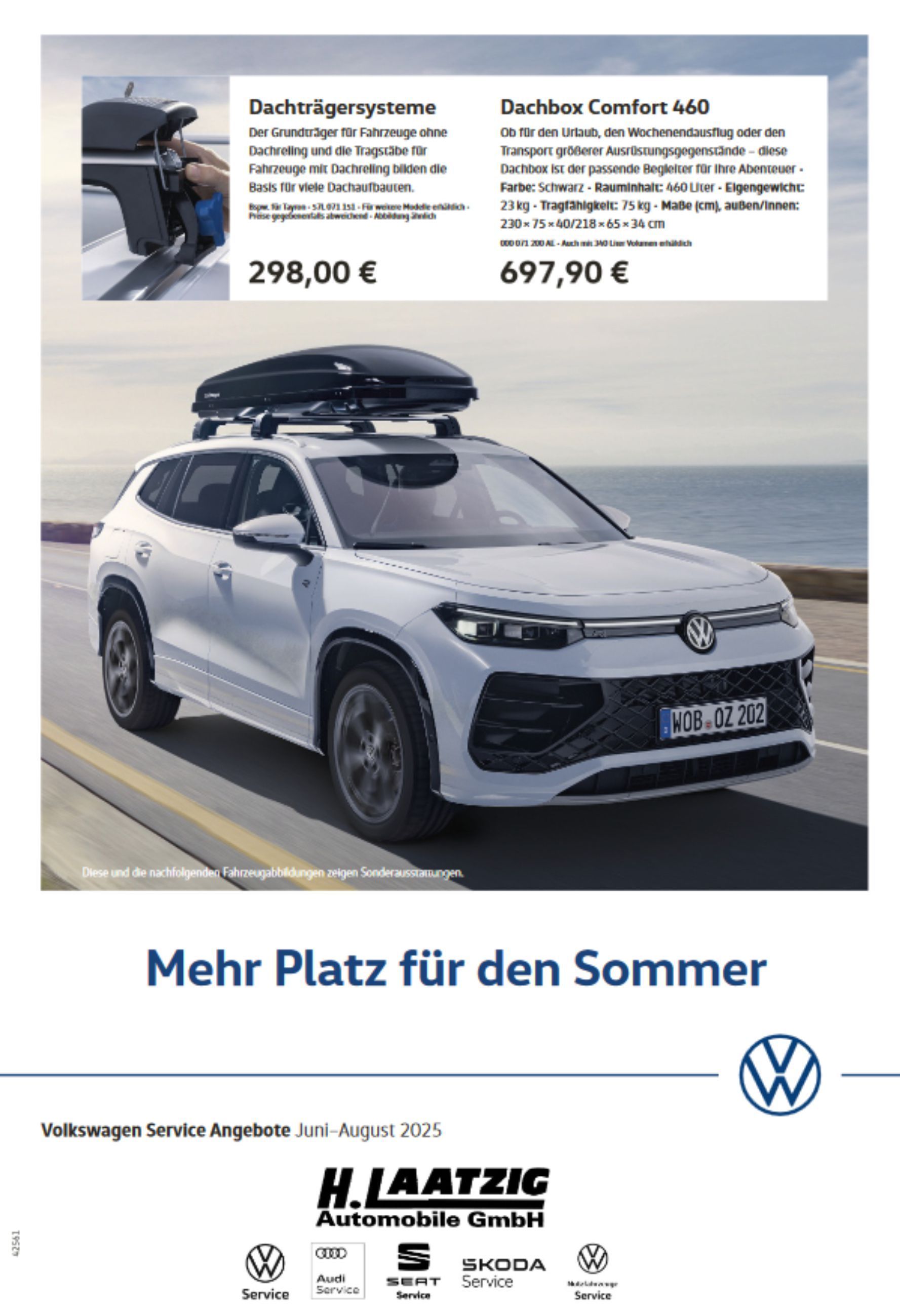 weißes Auto mit Dachbox