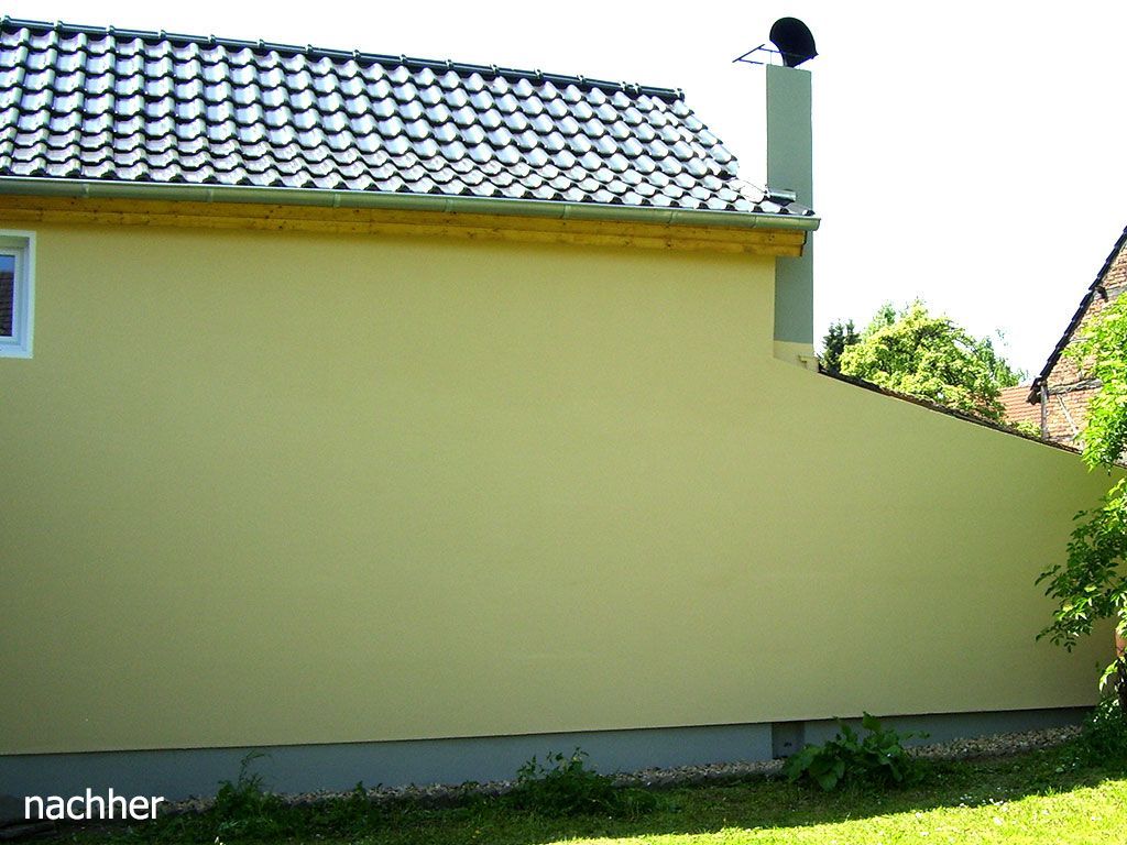 Ein Haus mit einem Schornstein darauf und dem Wort „nachher“ darunter