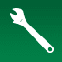 Llave inglesa blanca sobre fondo verde.