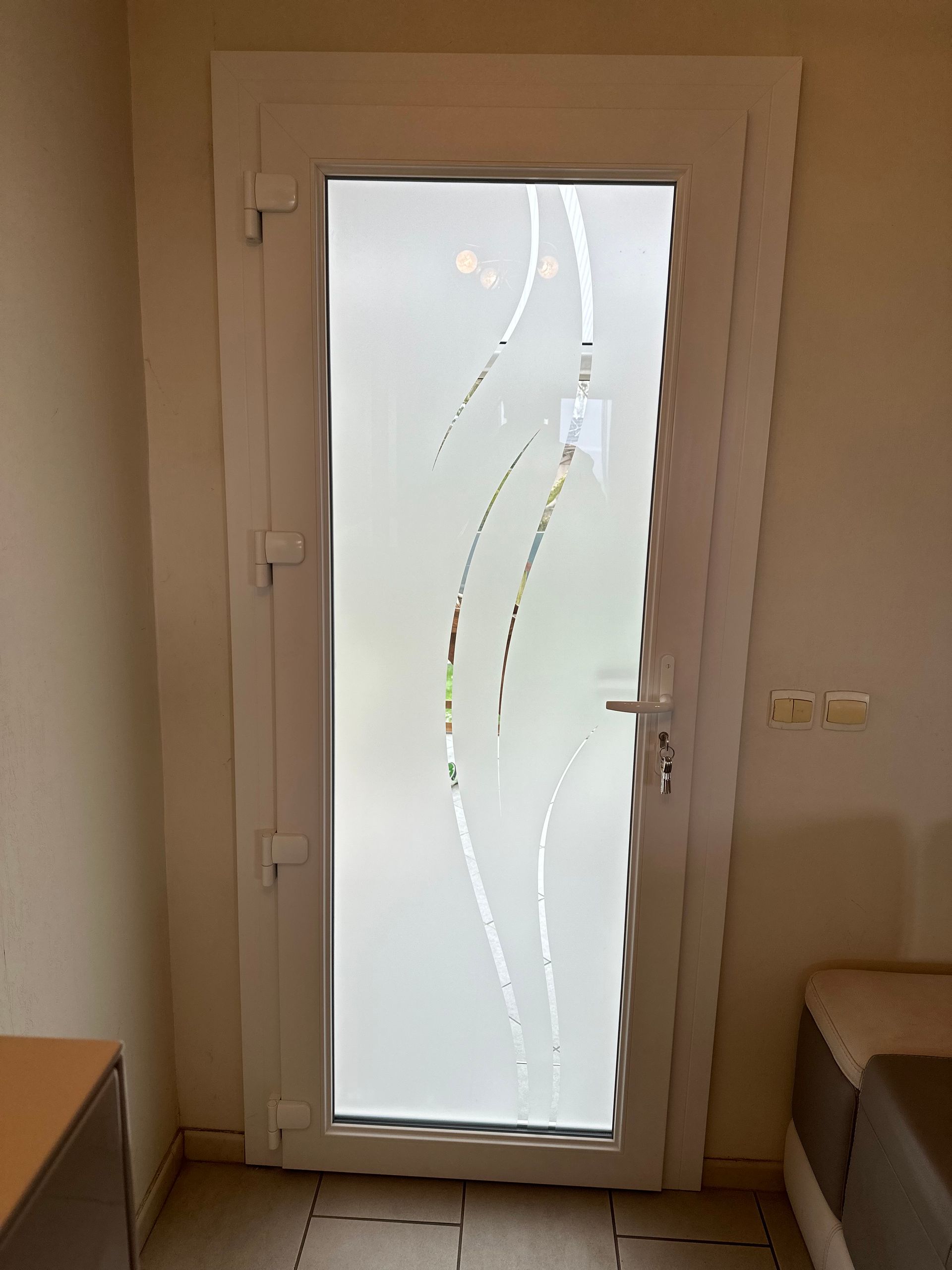 Porte d'entrée vitrée photo de l'intérieur