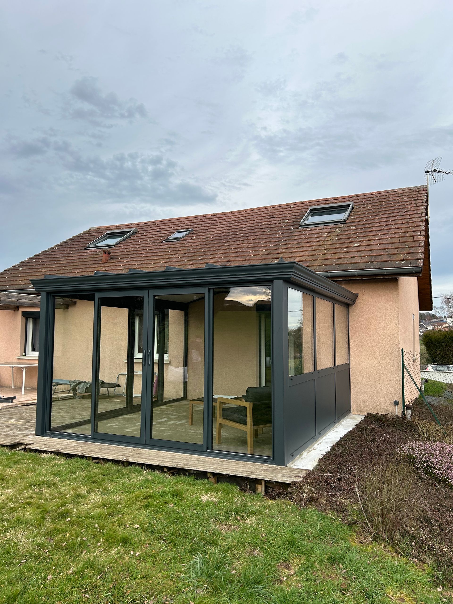 Véranda en PVC, aluminium et vitrerie