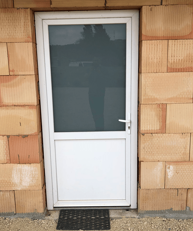 Porte de service en PVC