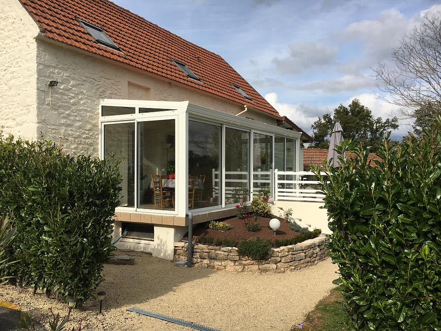 Véranda blanche et vitrage