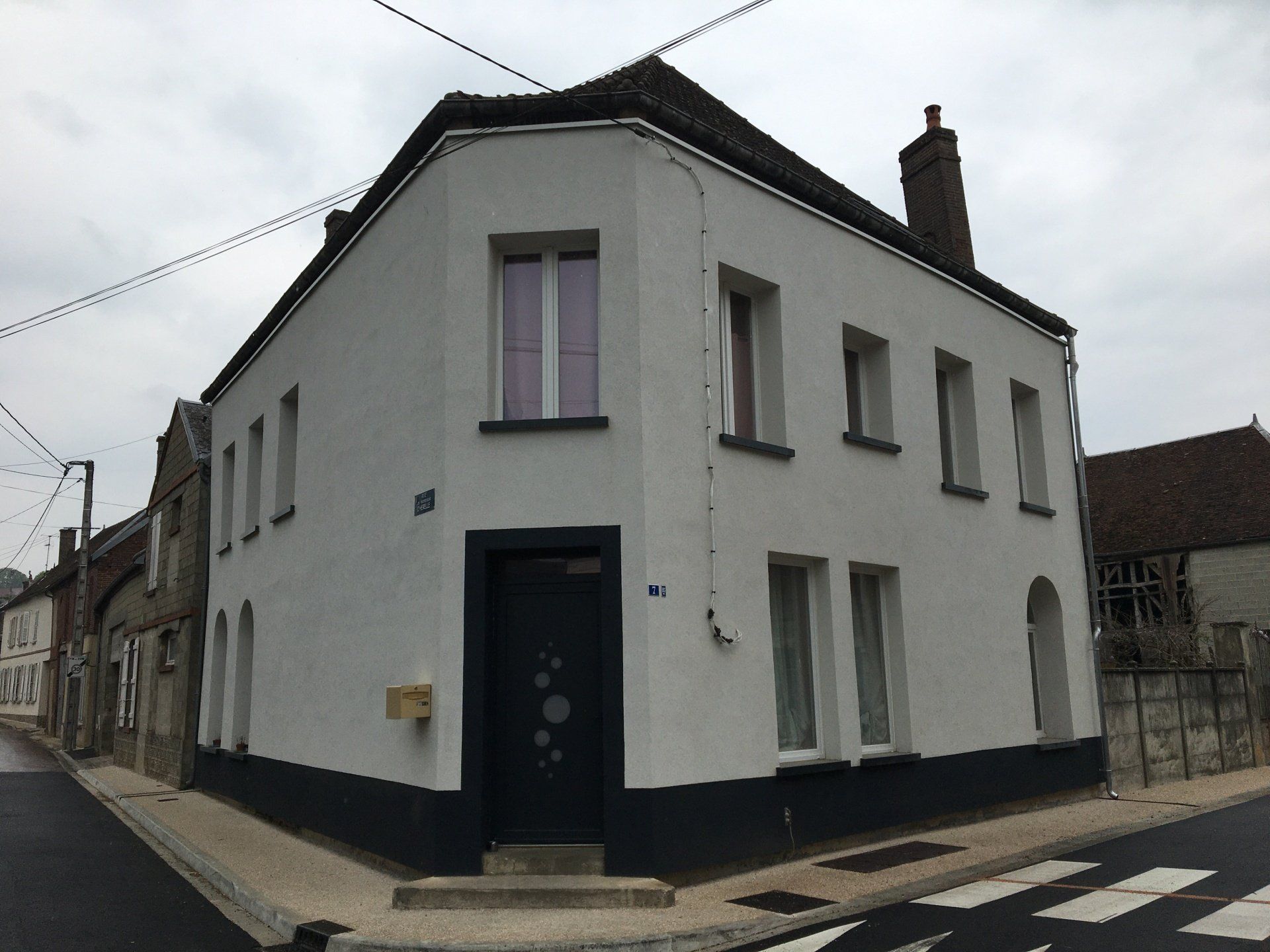 Maison d'angle isolation par l'extérieur