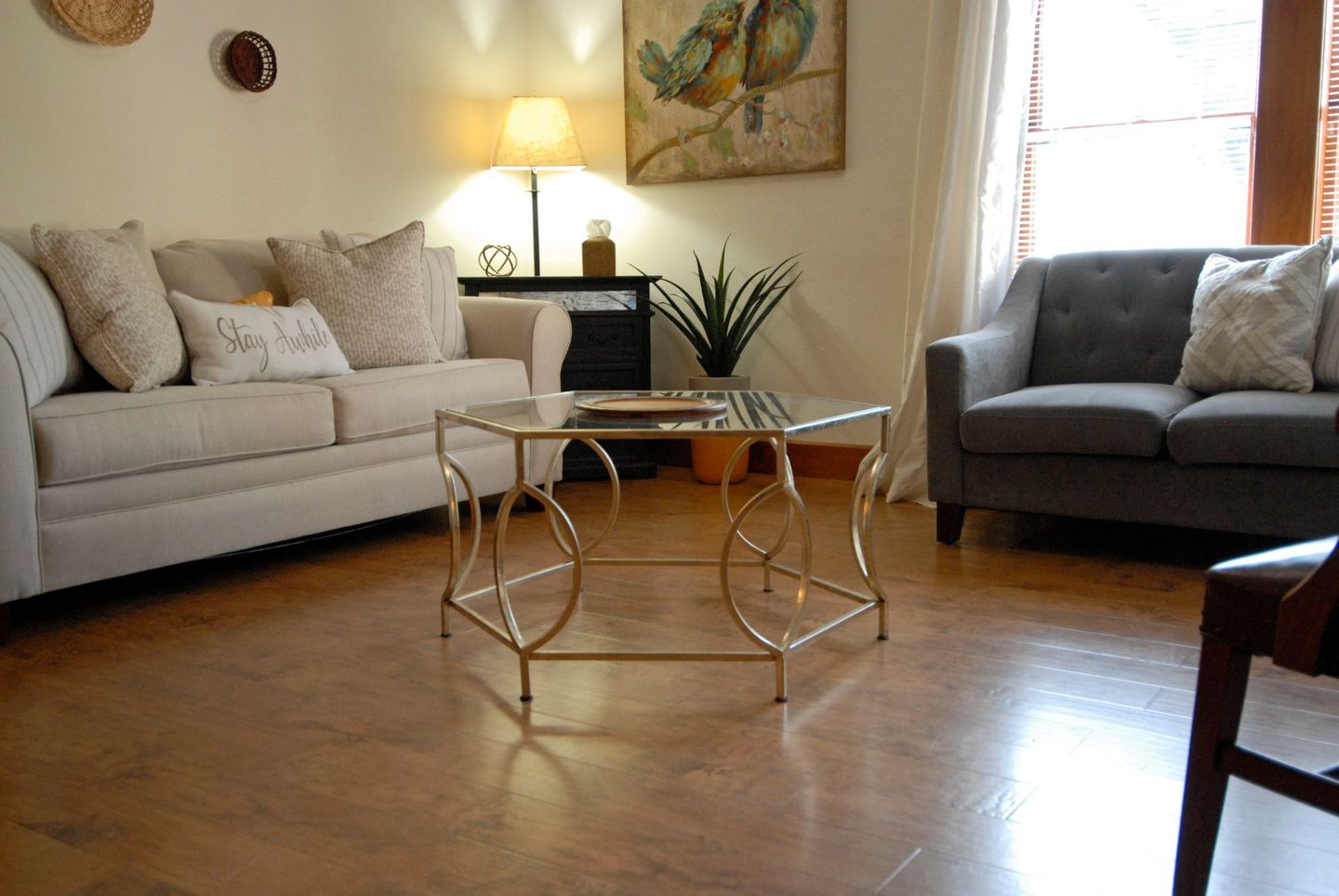 A living room with two couches and a coffee table