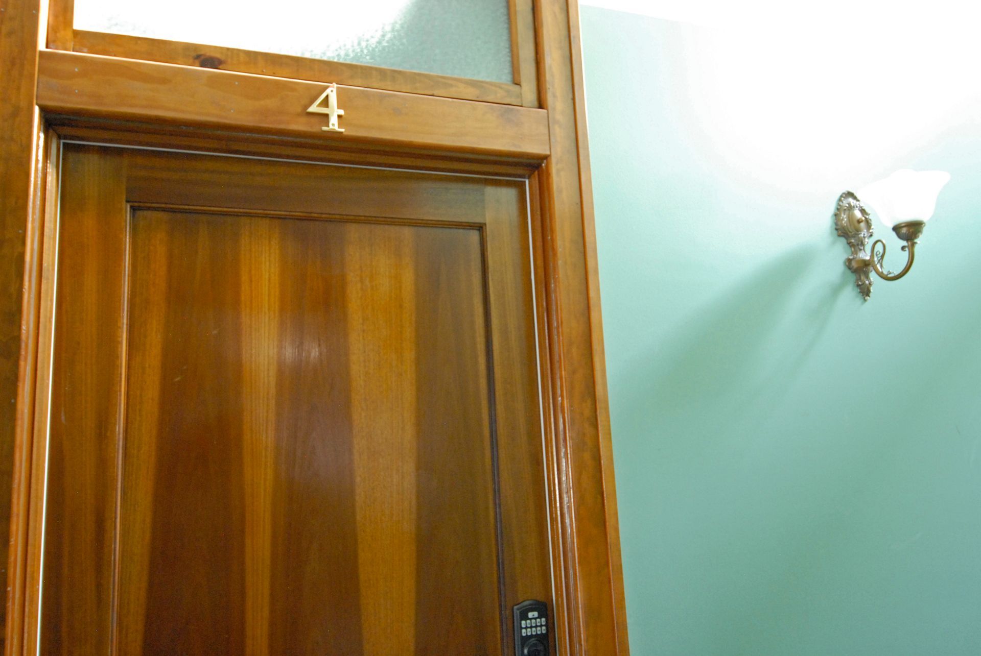 A wooden door with the number 4 on it