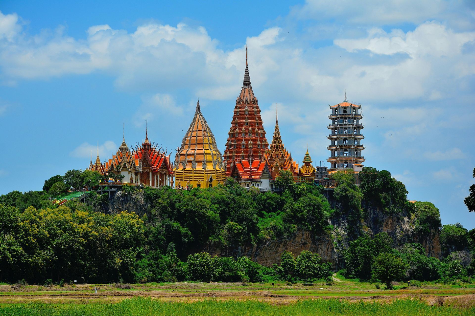 A group of temples are sitting on top of a hill