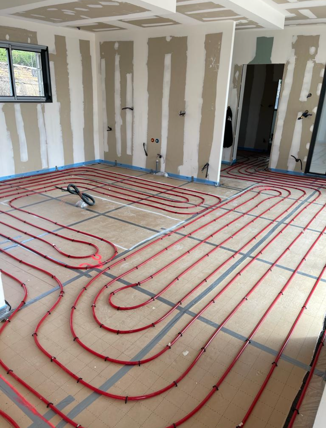 Mise en place d'un plancher chauffant.