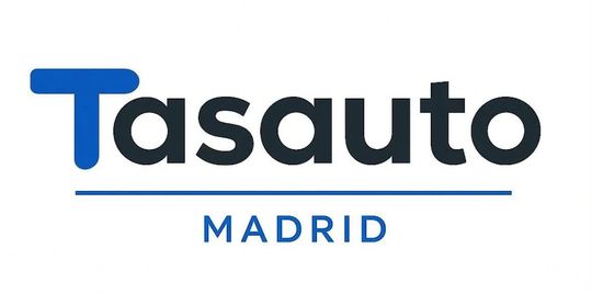 Logotipo de Tasauto Madrid en texto azul y negro con subrayado azul.