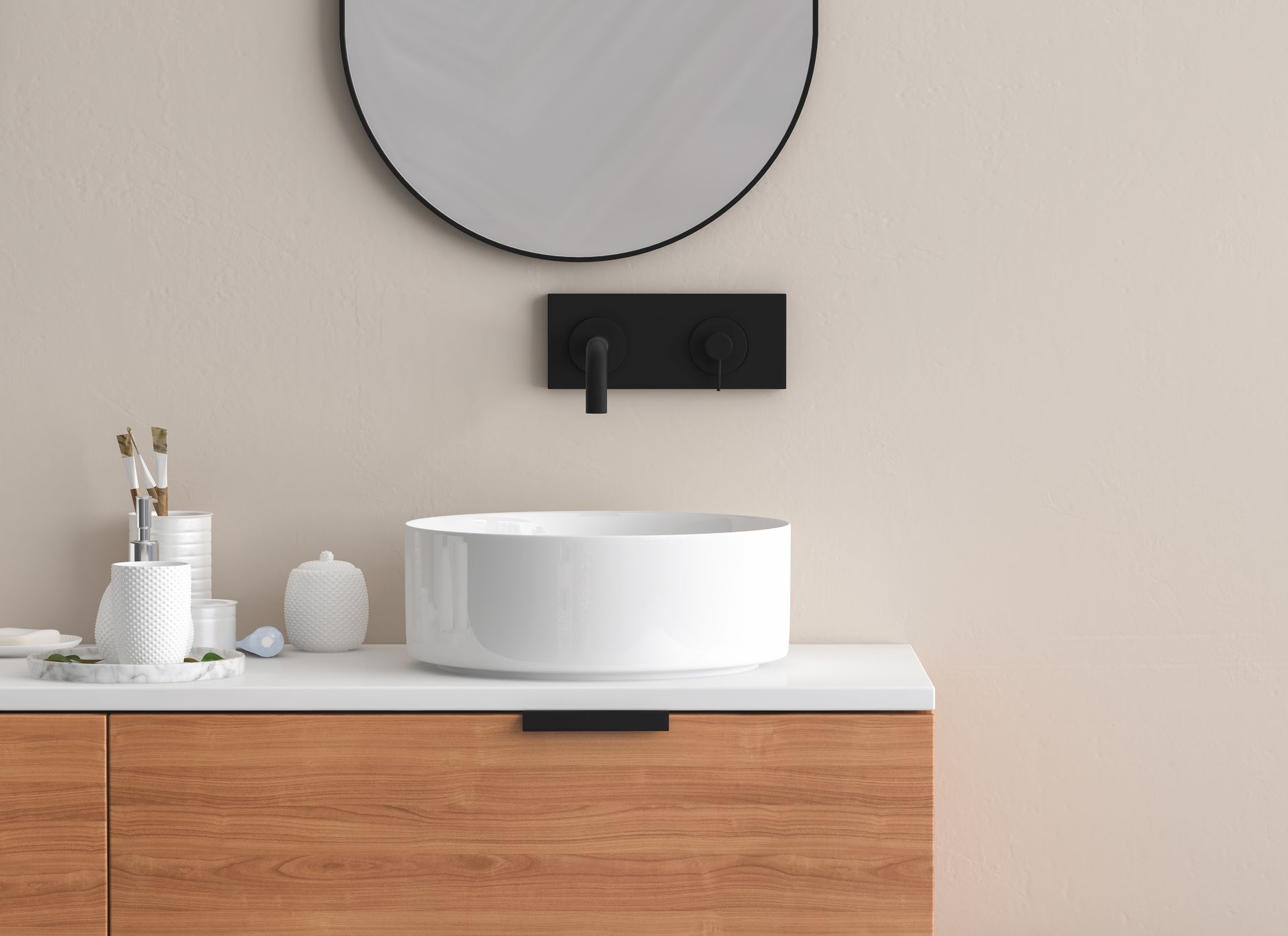 Meuble lavabo minimaliste avec miroir rond, robinet noir et vasque blanche sur un meuble en bois.