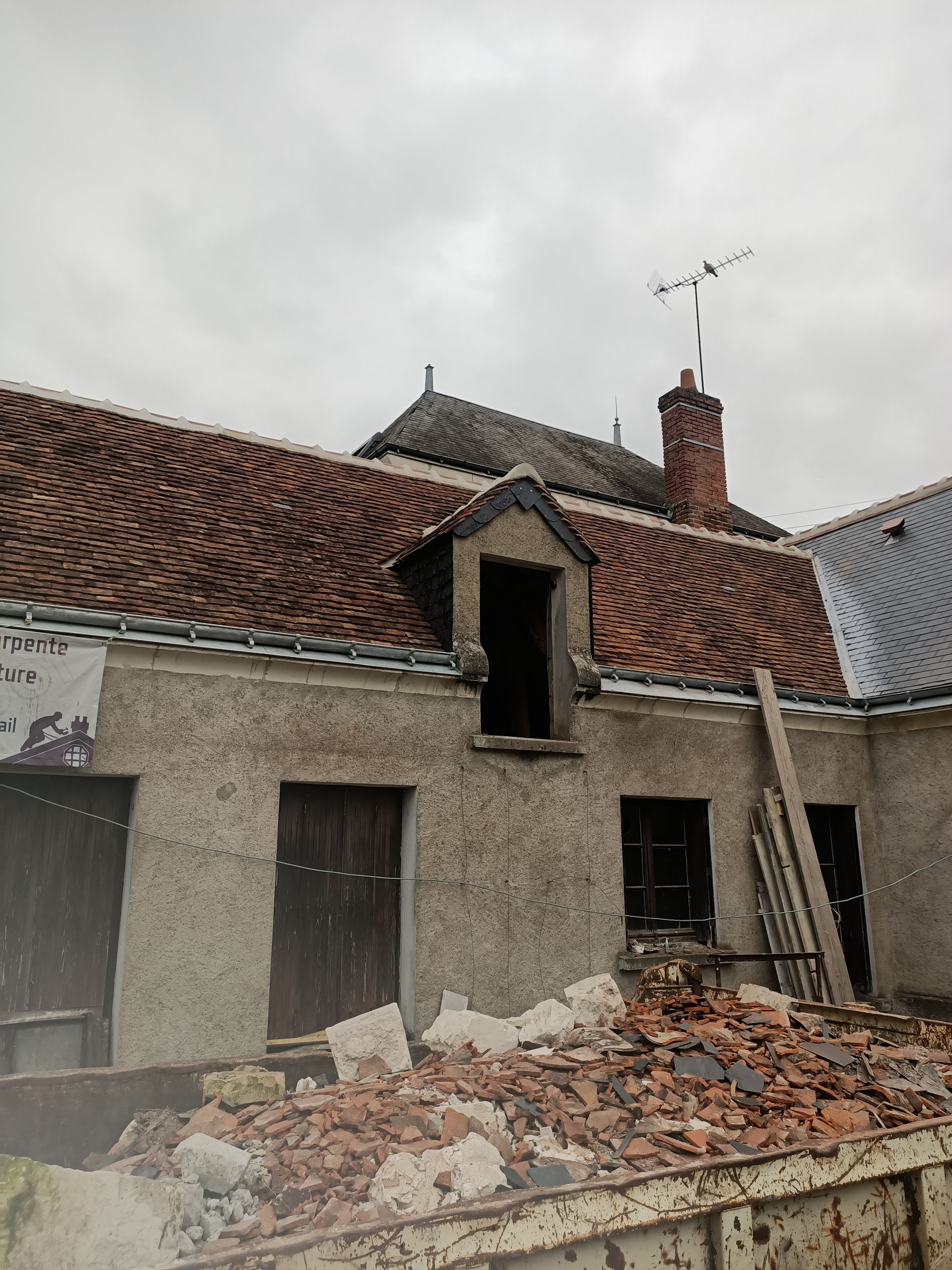 Remplacement de toiture en tuile pour de l'ardoise