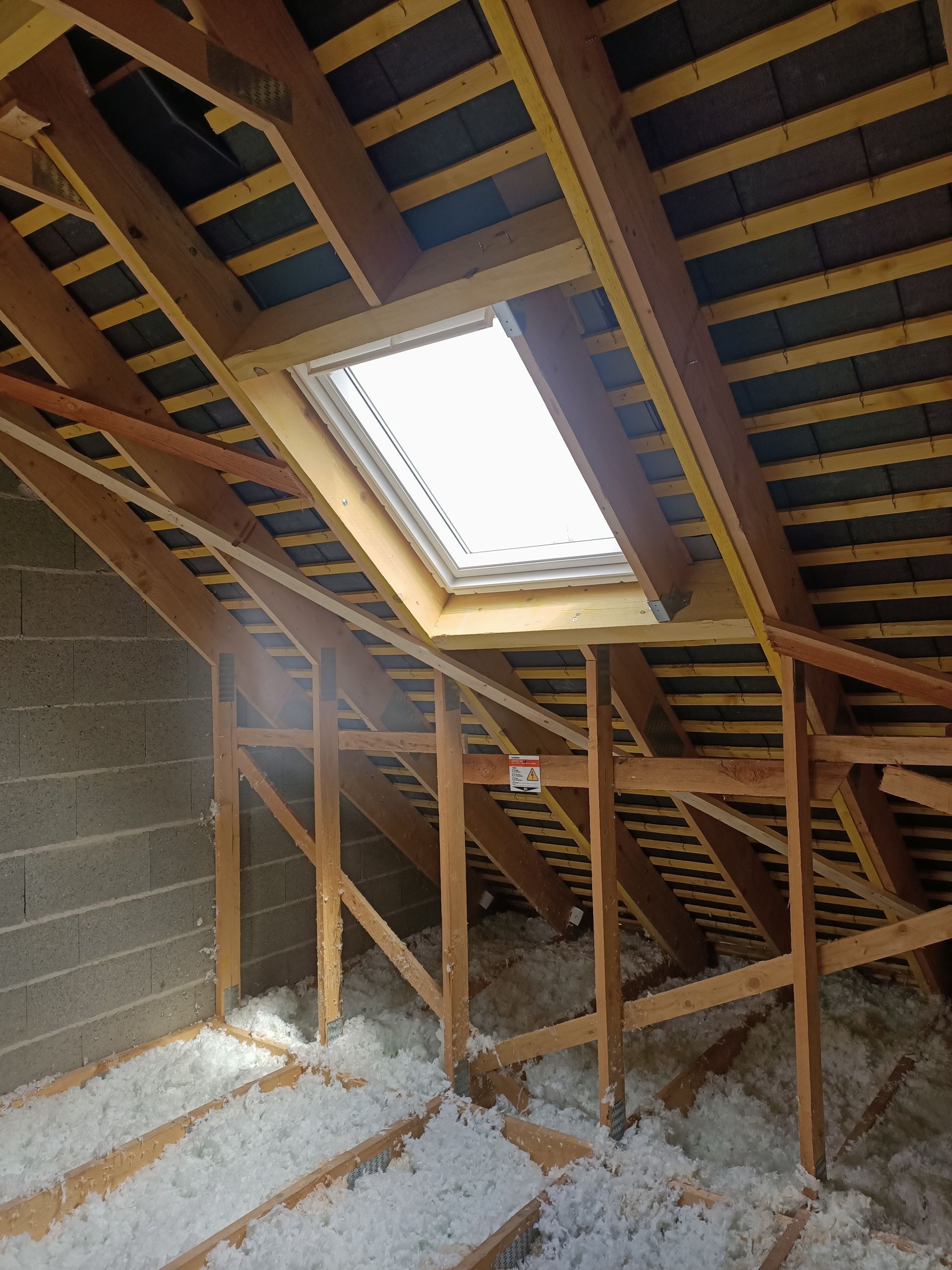 Charpente en bois dans les combles