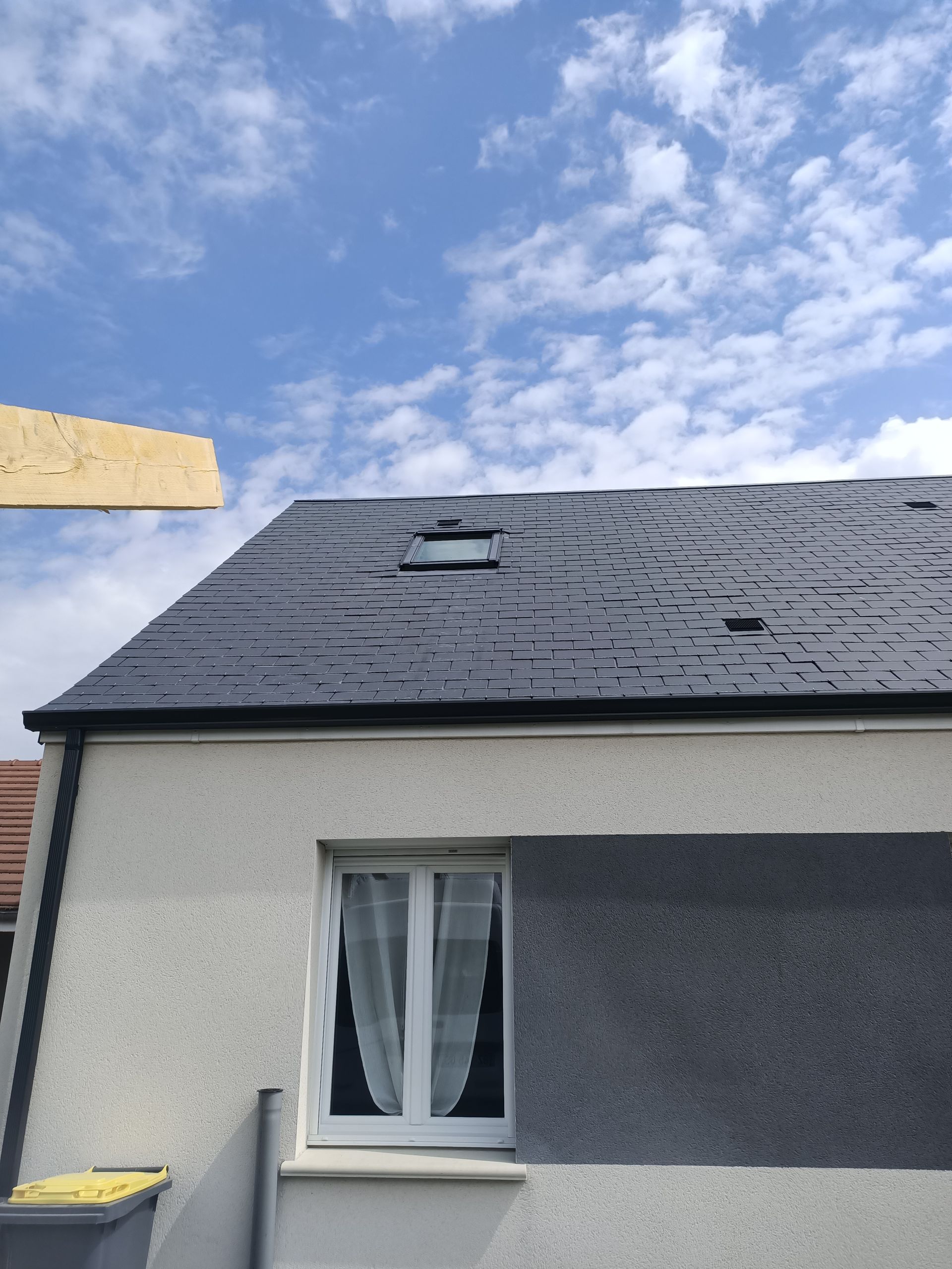 Maison neuve en tuile et ardoise