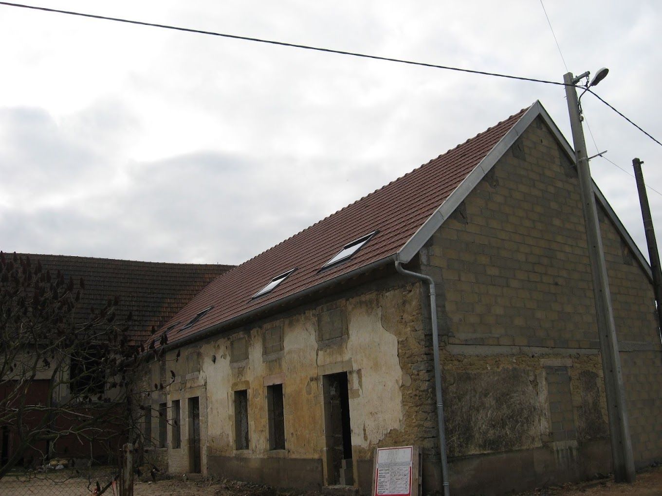 Toiture rénovée sur une maison ancienne