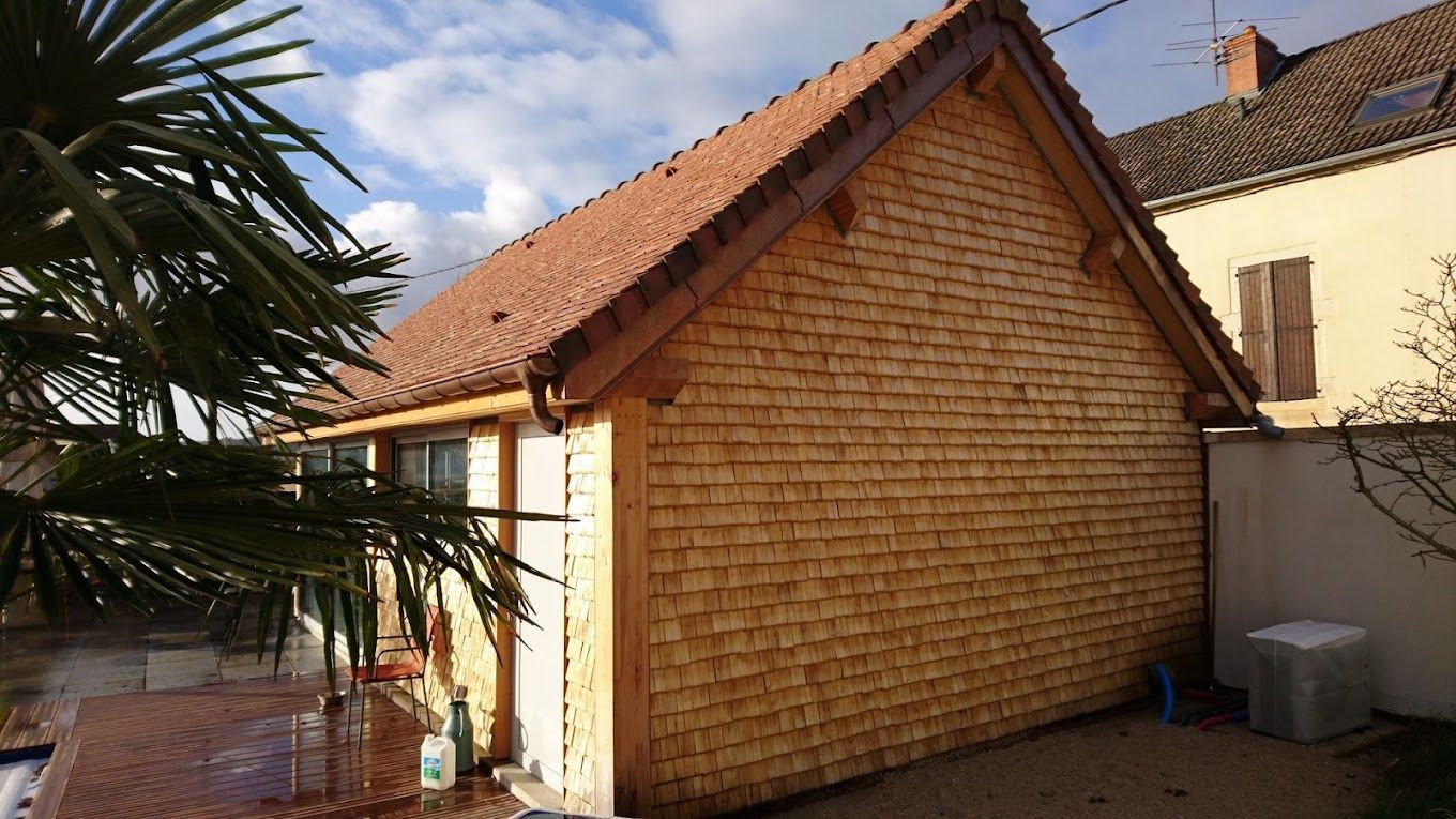 Maison avec gouttière cuivrée