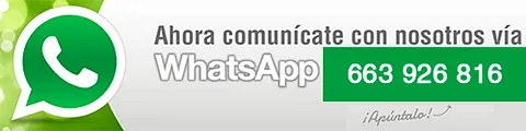 Un cartel verde y blanco que dice ahora comunicate con nosotros vía whatsapp