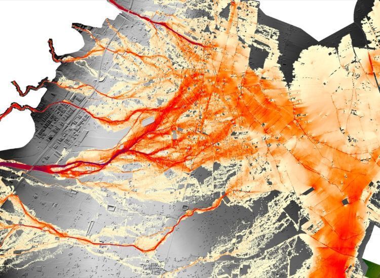 Flujos rojos y naranjas, posiblemente lava o agua, se extienden sobre un paisaje gris y blanco.
