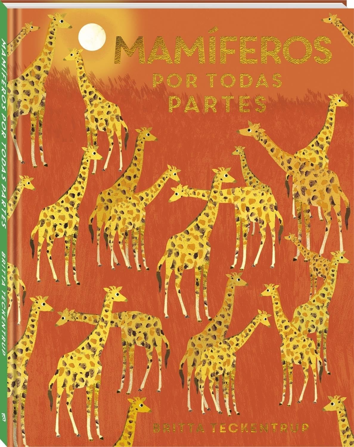 A book called mamiferos por todas partes has giraffes on the cover
