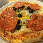 Dégustez nos pizzas cuites au feu de bois