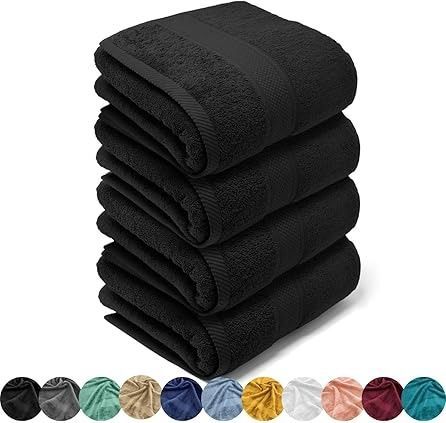 Pila de seis toallas de baño negras con varias opciones de colores en la parte inferior.