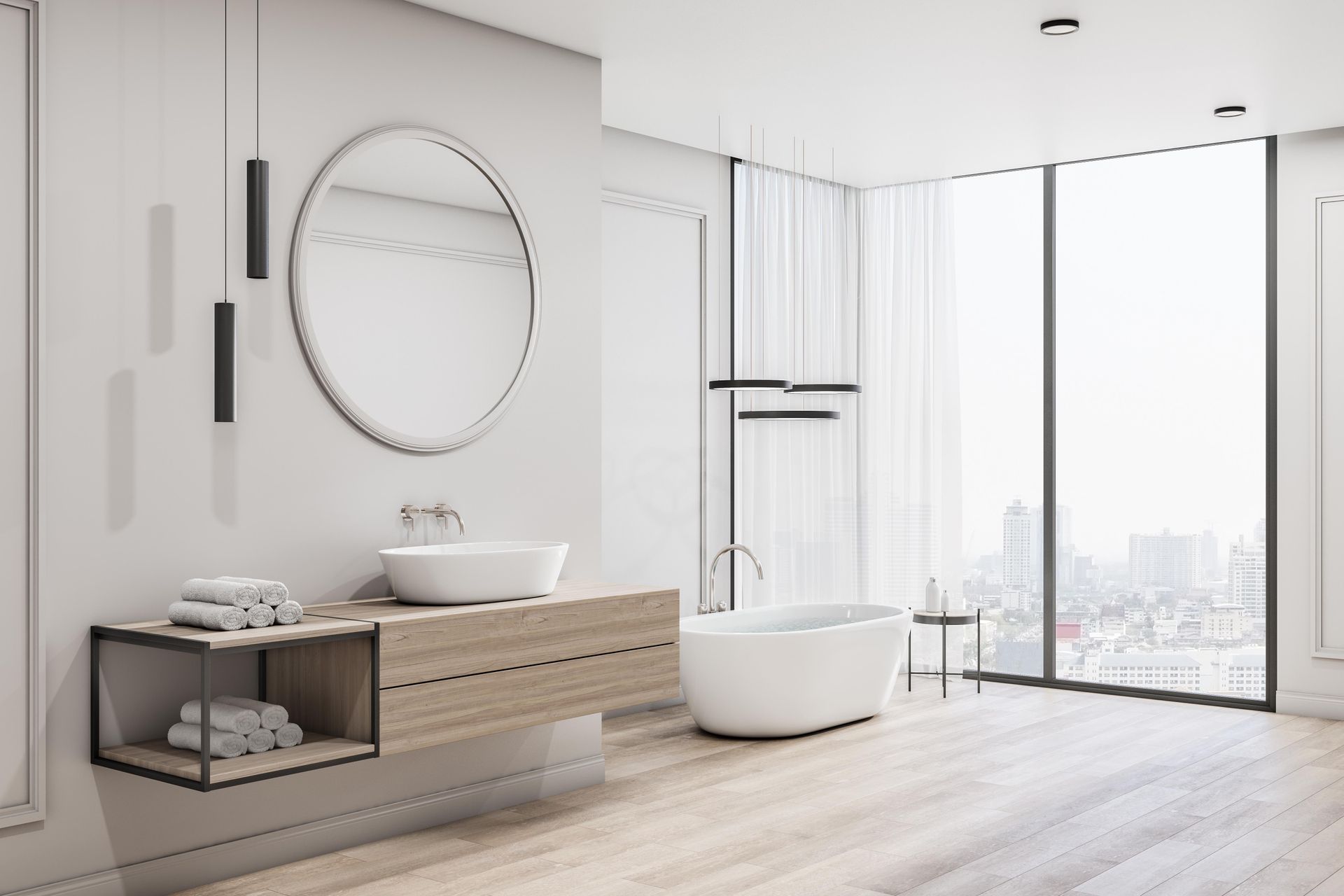 Modernes Badezimmer mit schwebendem Waschtisch, rundem Spiegel, Badewanne und großem Fenster.