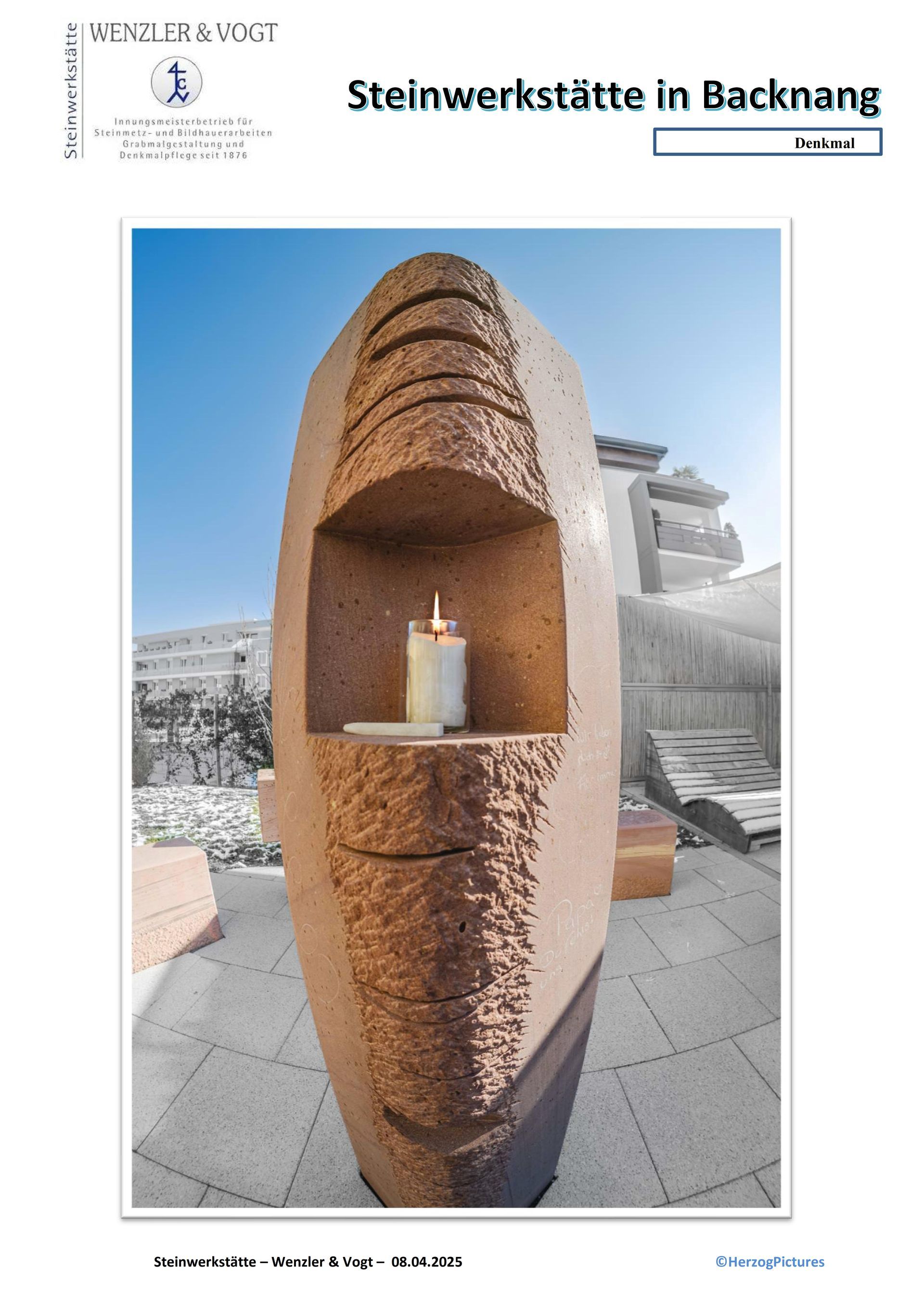 Ein Bild einer Steinskulptur mit einer Kerze darin