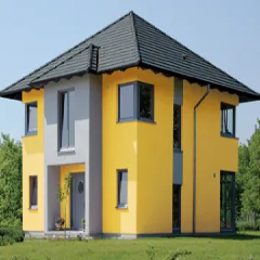 Ein gelb-graues Haus mit einem grauen Dach