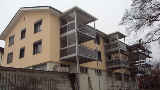 Regli Maler GmbH – frische Fassade mit Balkonen