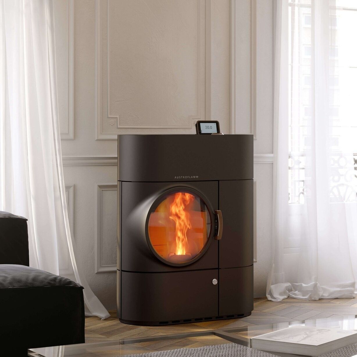 Eleganter AUSTROFLAMM Kaminofen im klassischen Wohnraum – hochwertige Heizlösung mit Holz