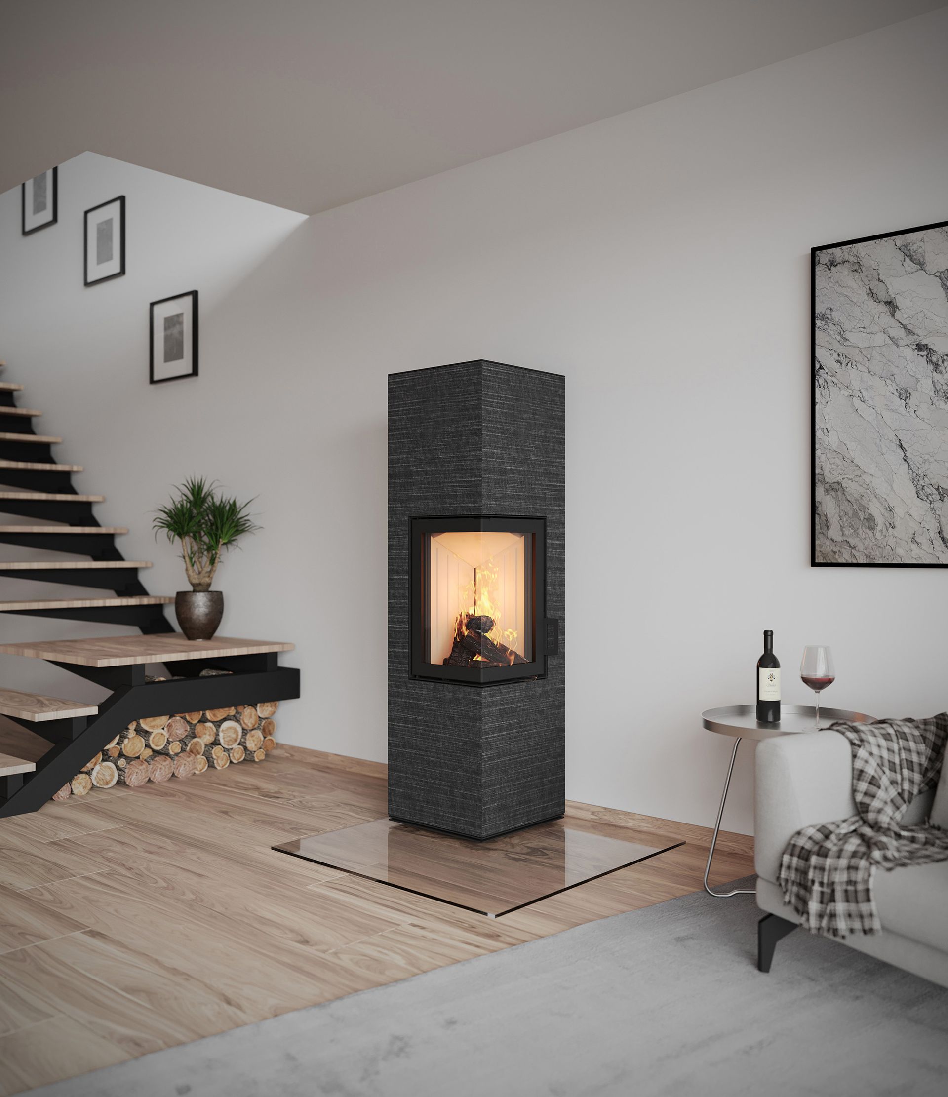 Monolith Kaminofen im offenen Wohnbereich mit Treppe – moderner Speicherofen für effizientes Heizen