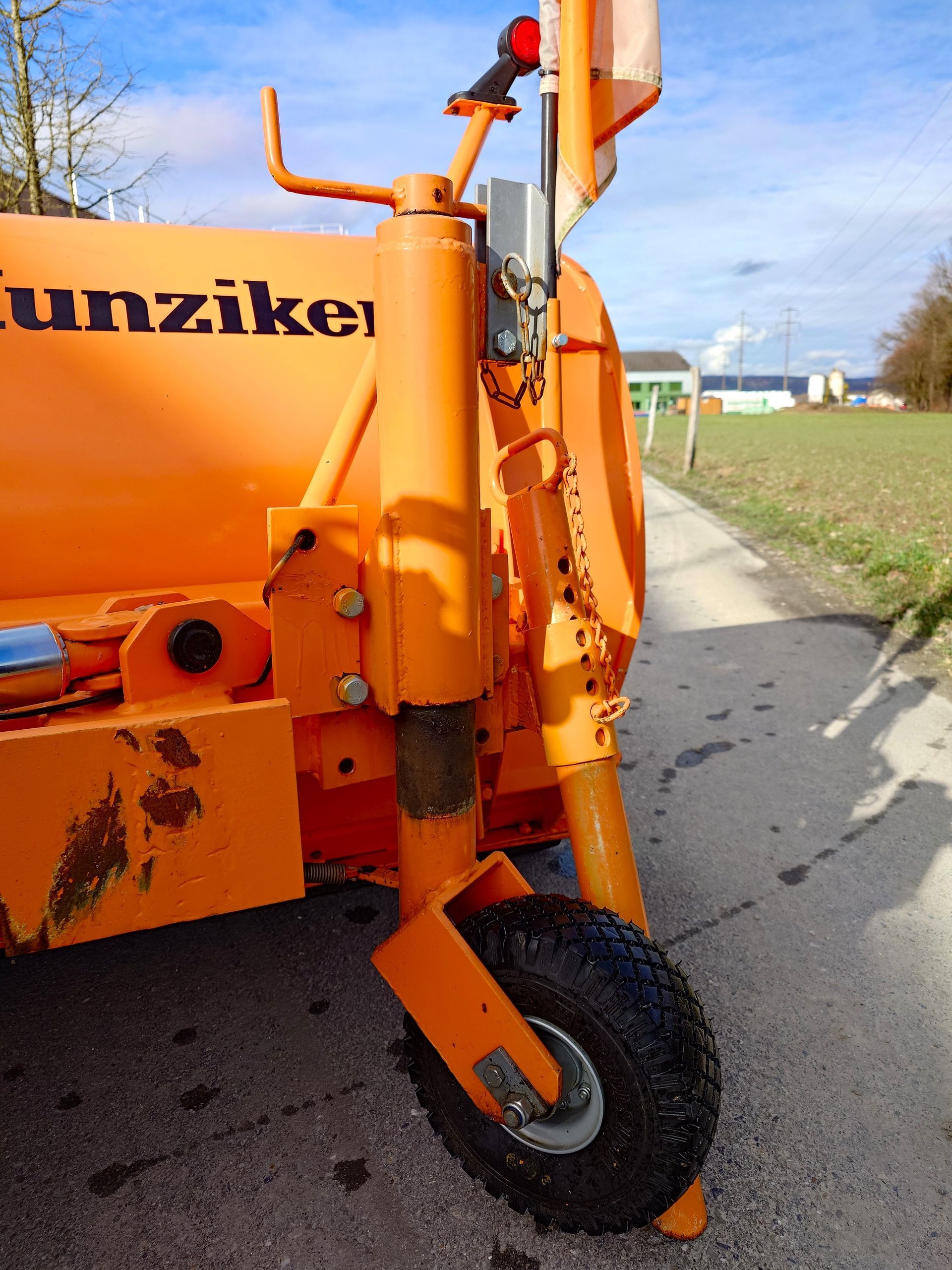 Radbaugruppe für landwirtschaftliche Geräte in Orange.