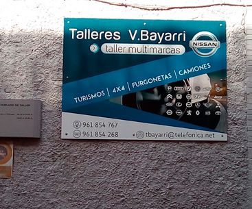 Un cartel que dice talleres v.bayarri.