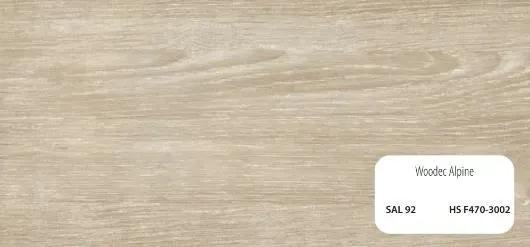 Superficie de madera con una etiqueta que dice