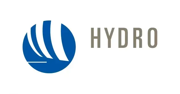 Logotipo de la empresa Hydro. Presenta un círculo azul con líneas curvas blancas y la palabra