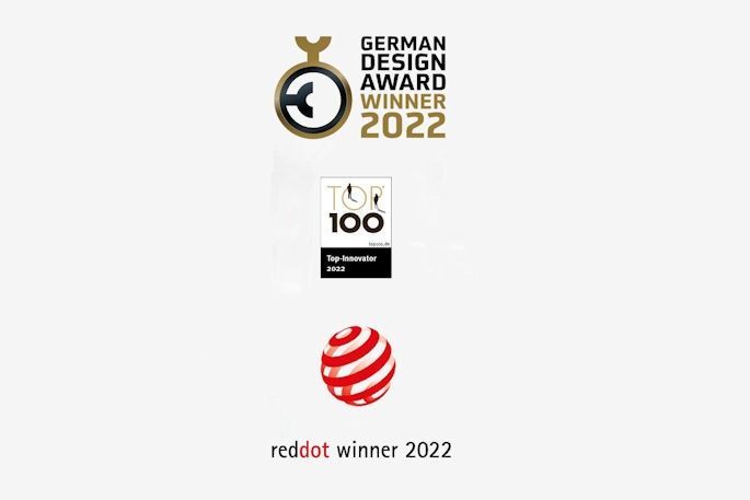 Premios: Ganador del Premio de Diseño Alemán 2022, Top 100 Innovator y Ganador del Red Dot 2022, exhibidos con logotipos.