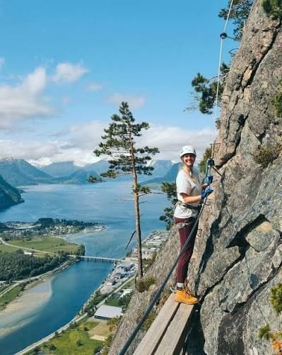 Climber on the Romsdalsstigen via ferrata above Åndalsnes