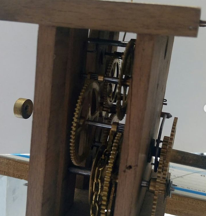 Réparation pendule bois
