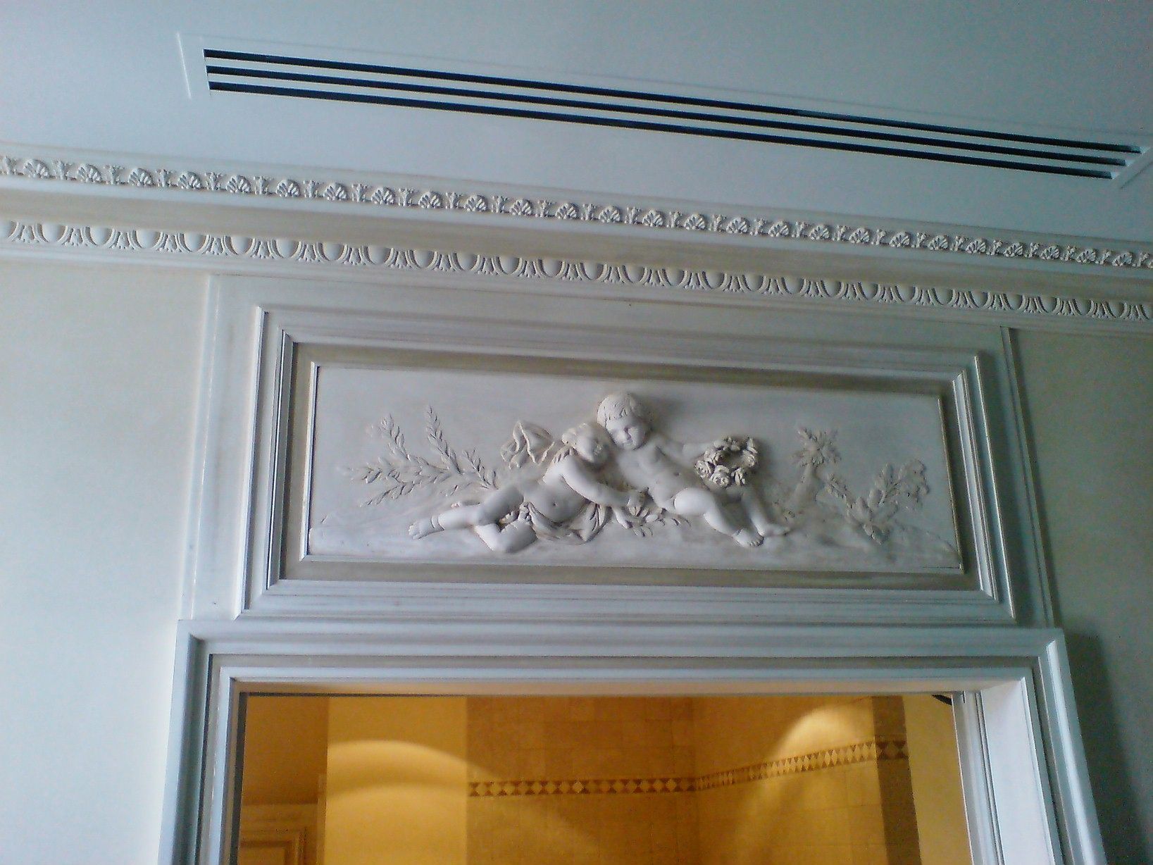 Rénovation de moulures avec des anges