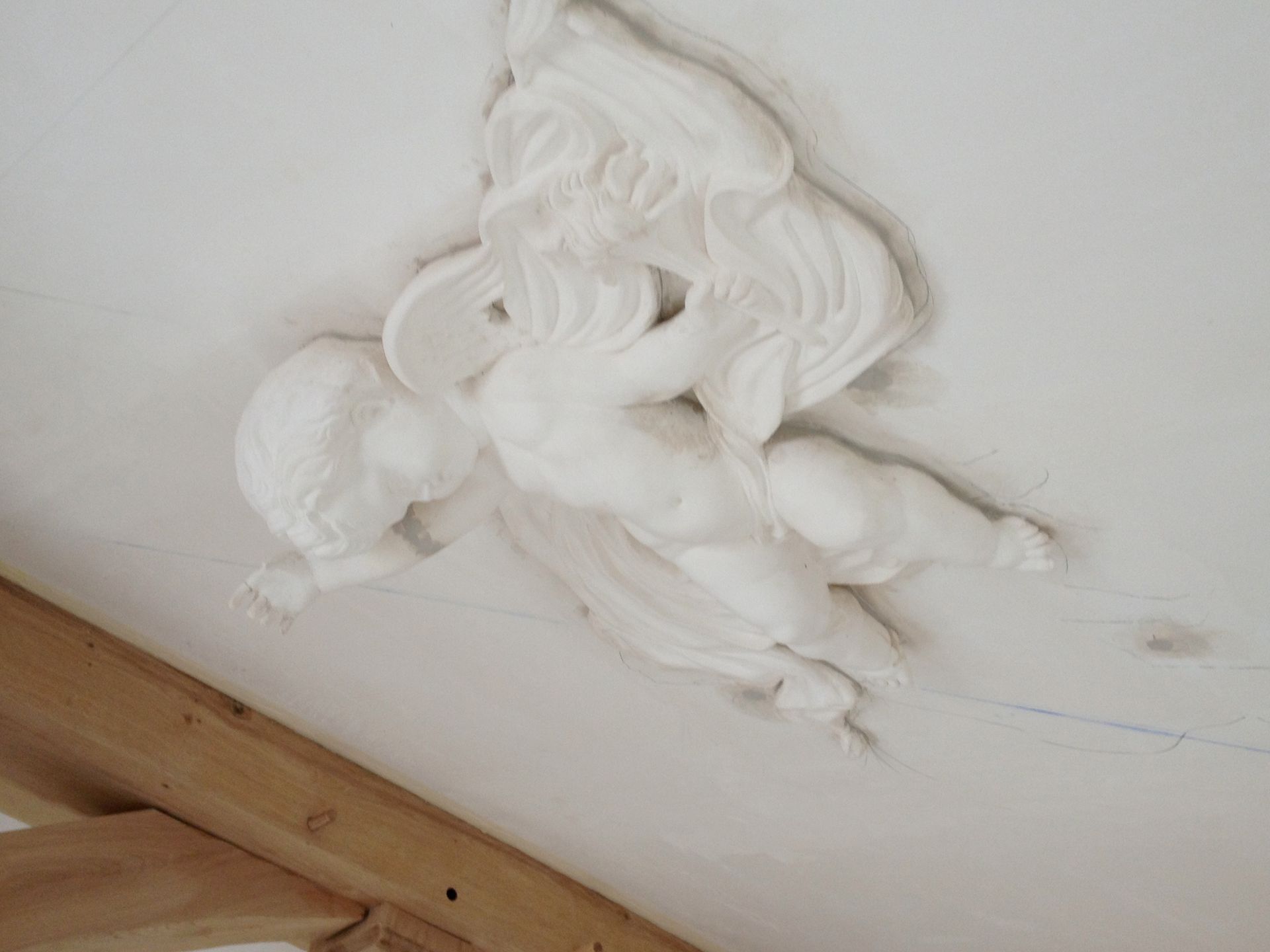 Rénovation d'un ange en staff