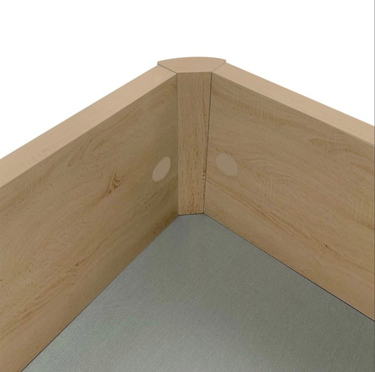 Un rincón interior de un marco de madera clara, donde se aprecia la unión 