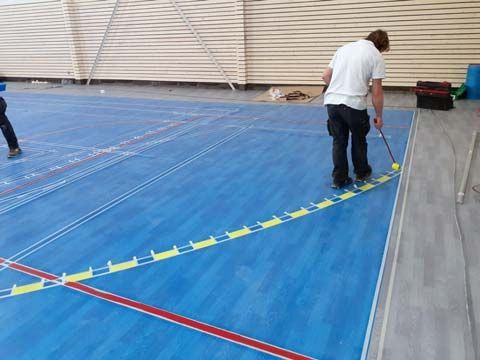 Peinture traçage salle de sport