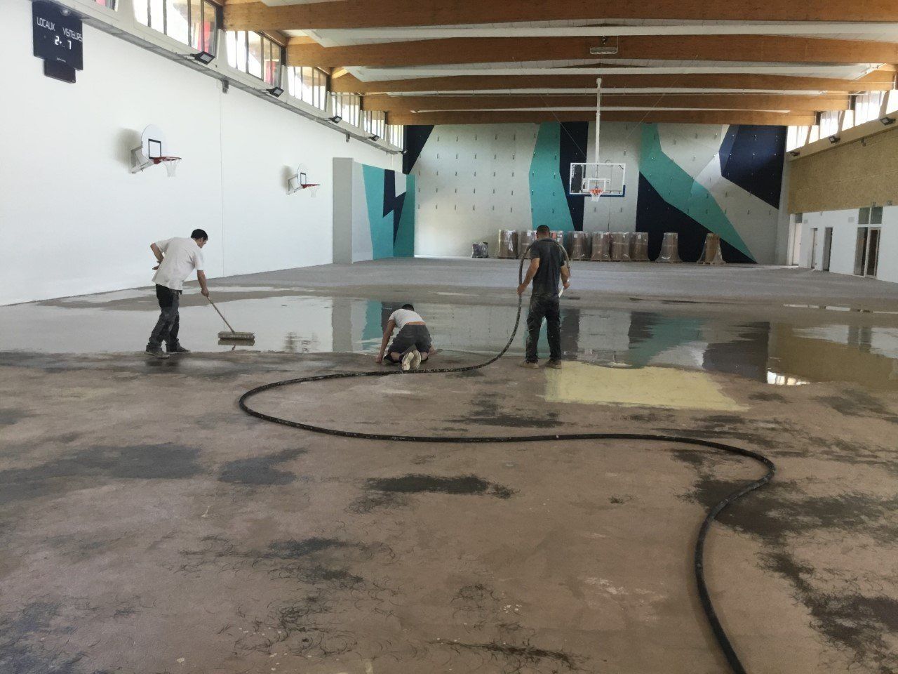 Chantier pose sol gymnase