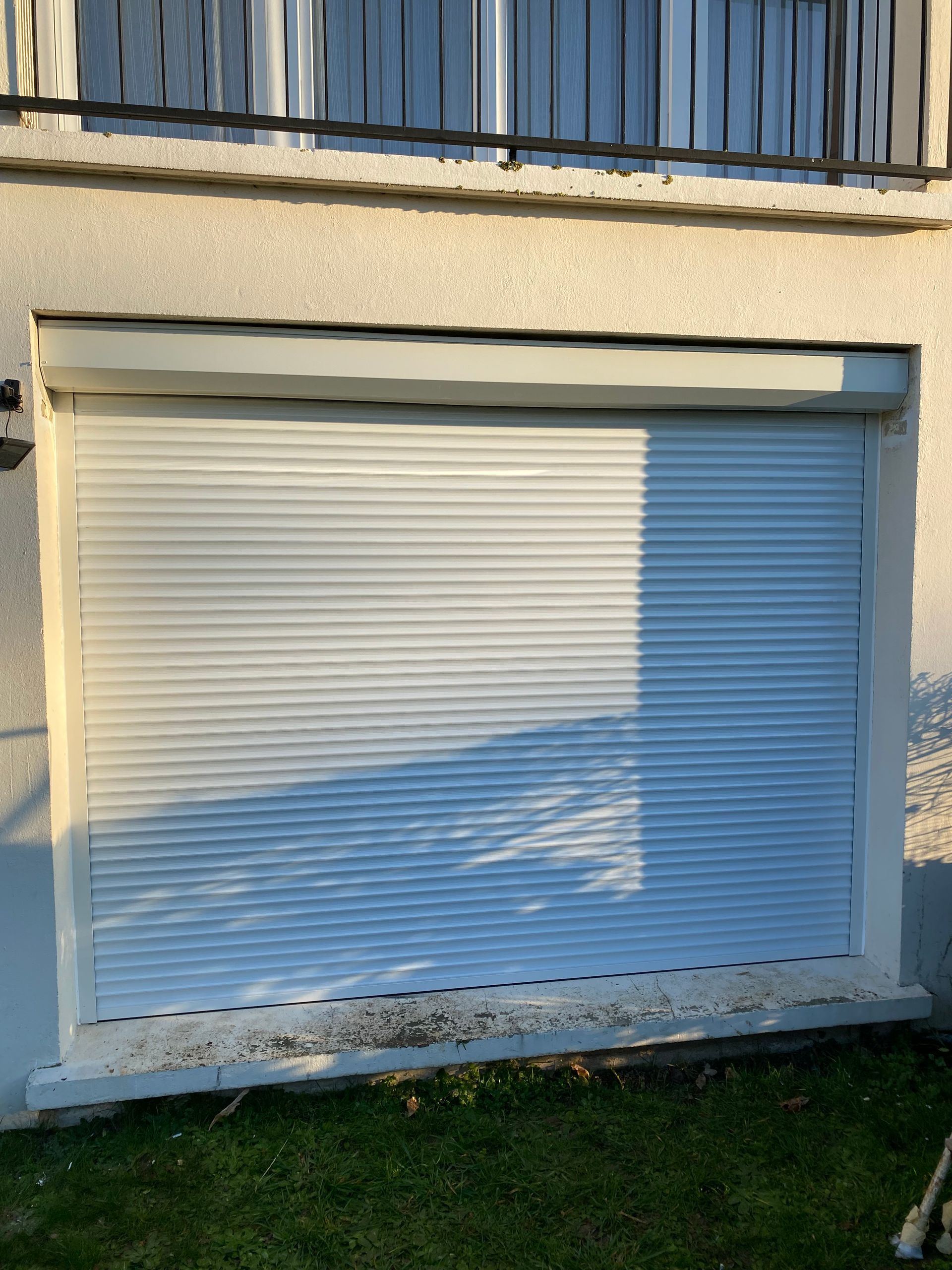 Installation volets roulants pour baie vitrée