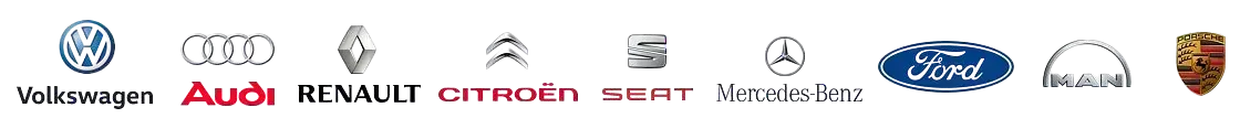 Una imagen borrosa de varios logotipos de automóviles sobre un fondo blanco.