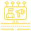 Un icono amarillo de un monitor de computadora con un megáfono encima.