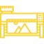 Un icono amarillo de una máquina con una imagen de una montaña en él.