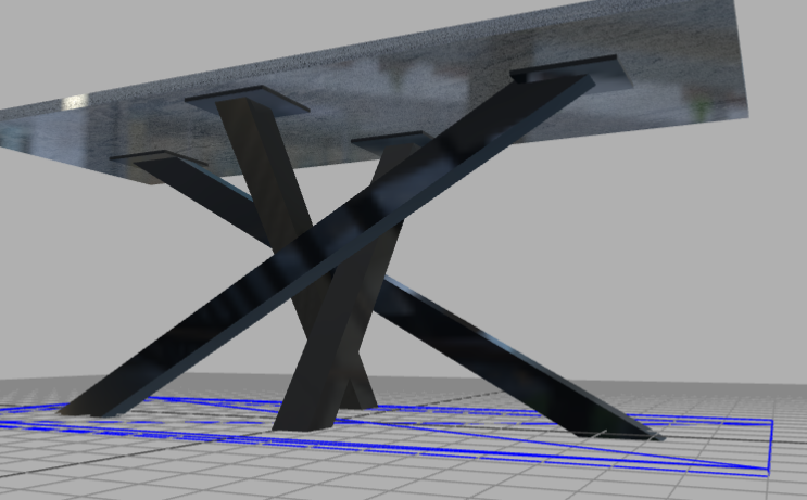 Une table moderne avec un plateau en verre et des pieds en métal noir en forme de X sur un sol carrelé gris.