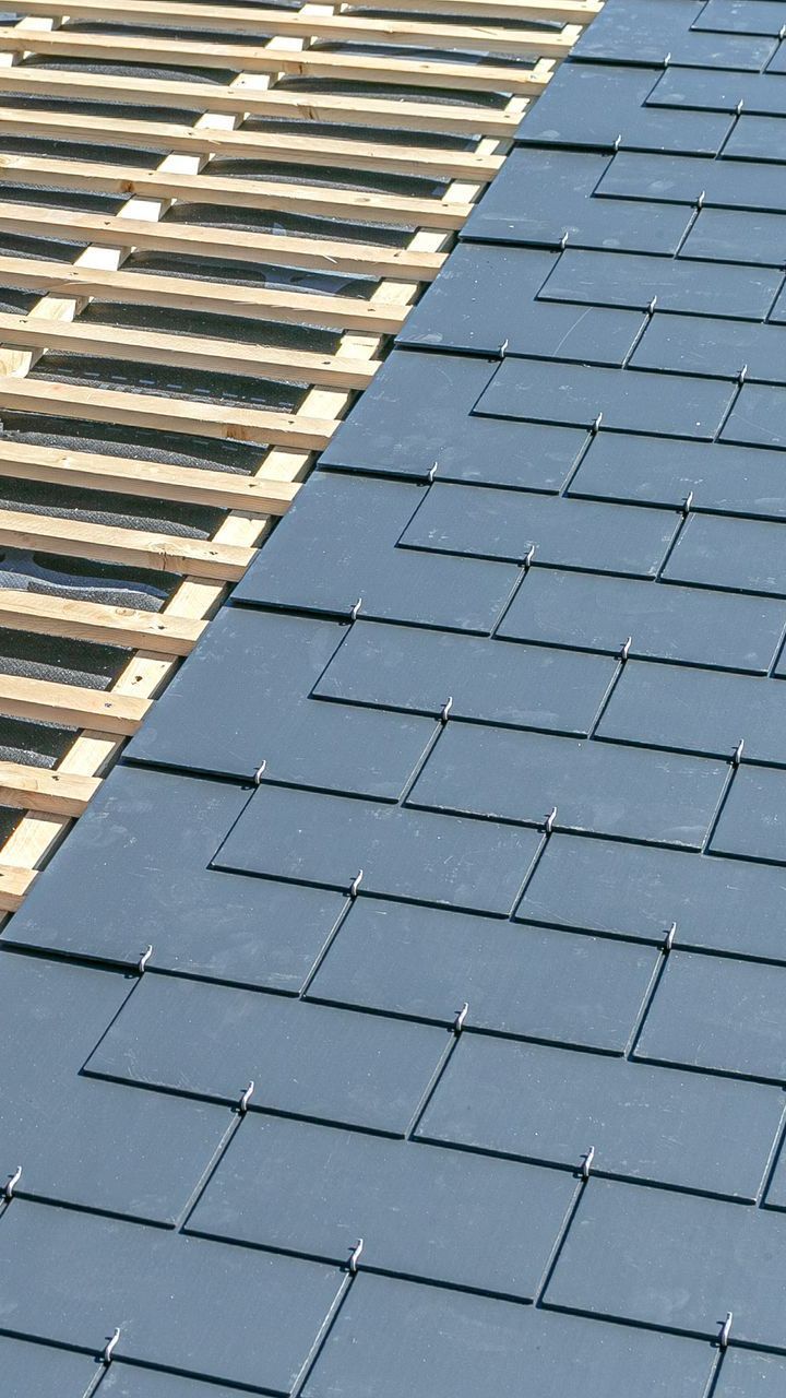 Rénovation d'une toiture en ardoise