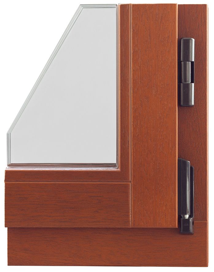 Eine Nahaufnahme eines Holzfensters mit einem Glasfenster.